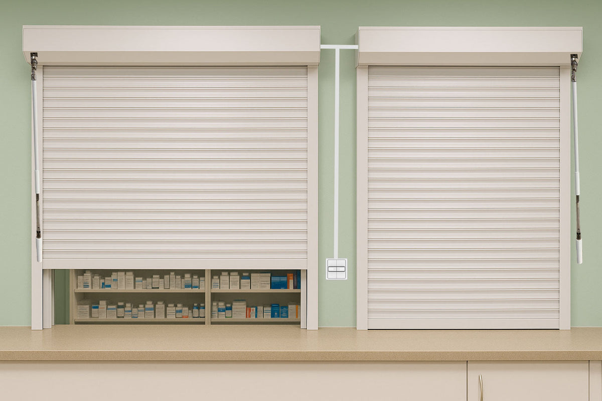 Two white internal window roller shutters installed in a pharmacy or clinical setting.
