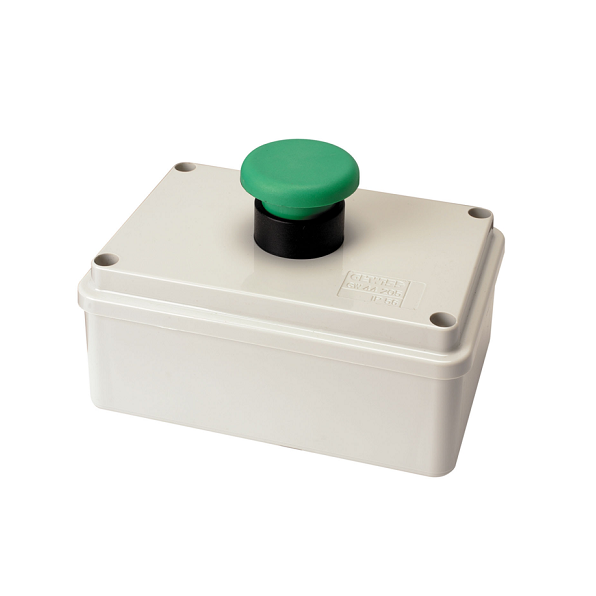 Green emergency stop button on a white industrial control box enclosure.